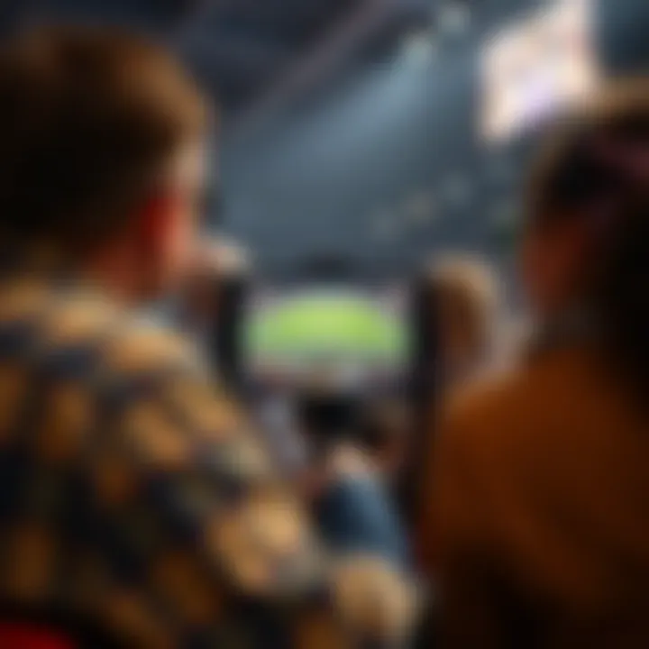 A digital device displaying a live sports event with enthusiastic viewers.